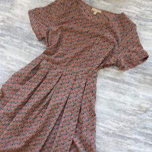 Flesh colored elephant print dress above the knee